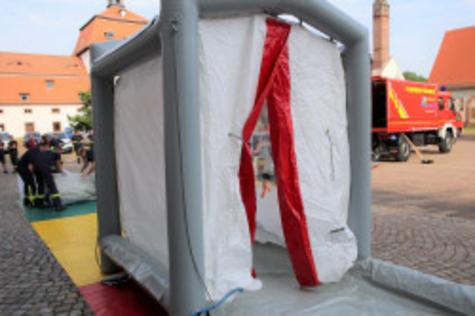 Dekontamination der Tr&auml;ger von Schutzanz&uuml;gen